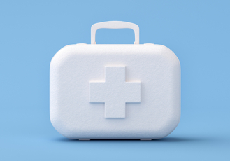 White medical first aid kit with a cross symbol representing emergency dental care services at Modern Dentistry of Peoria.